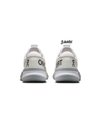 Rear view of On THE ROGER Pro 3 White Pink tennis shoes showing padded heels and On Court branding