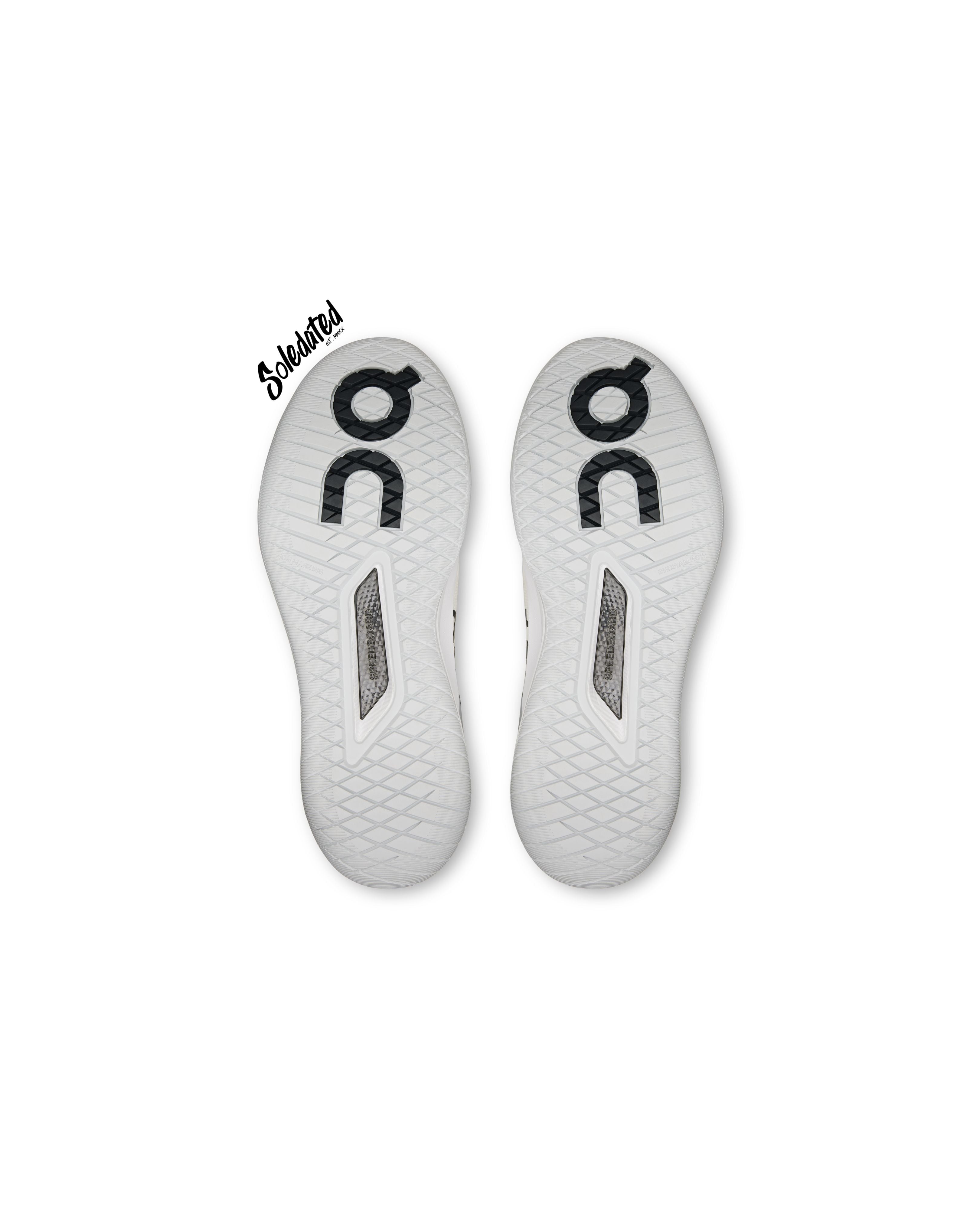 Outsole view of On THE ROGER Pro 3 White Pink showing hard-court traction and Speedboard