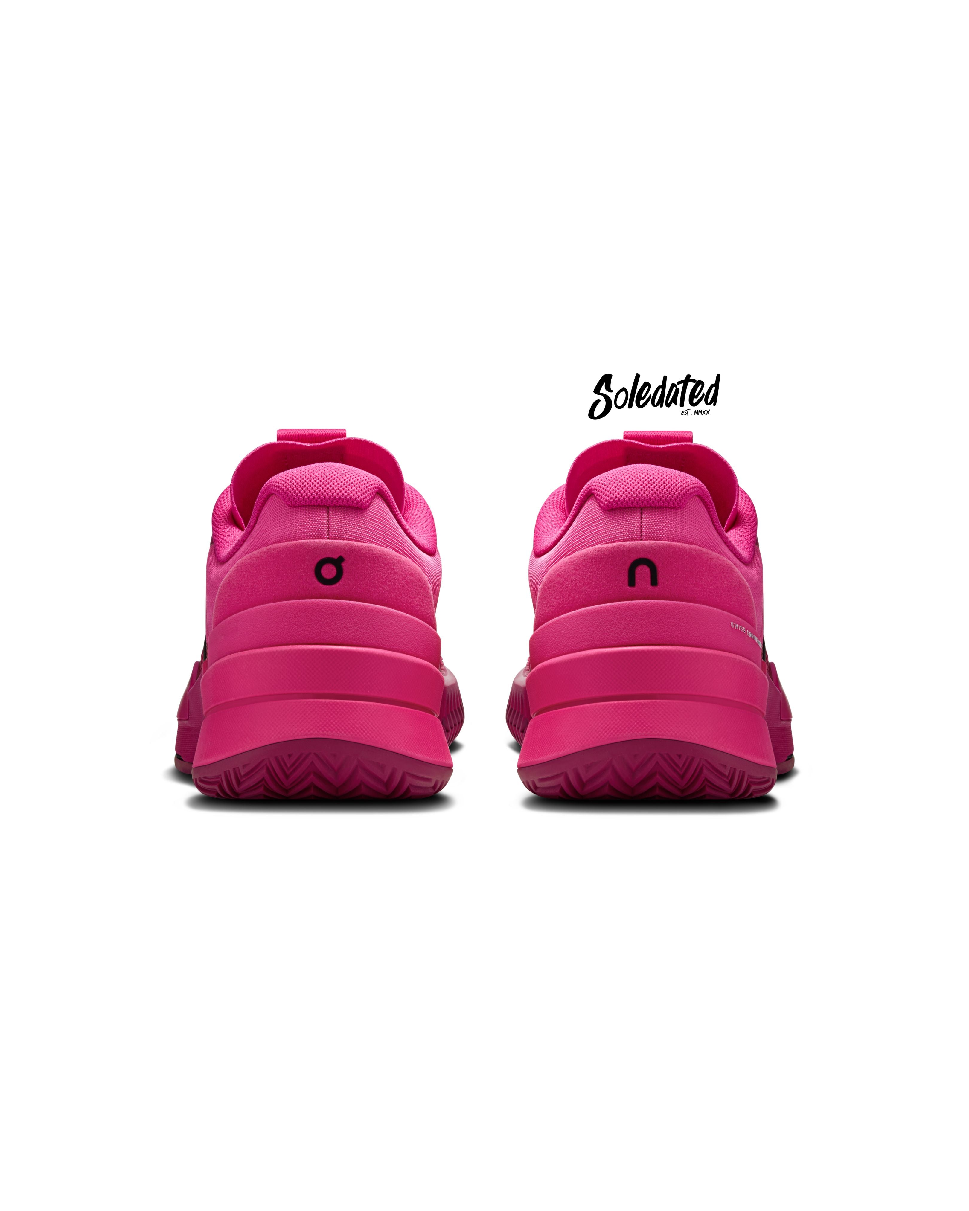 Rear view of On THE ROGER Pro 2 Pink Grenadine showing padded heels and outsole traction