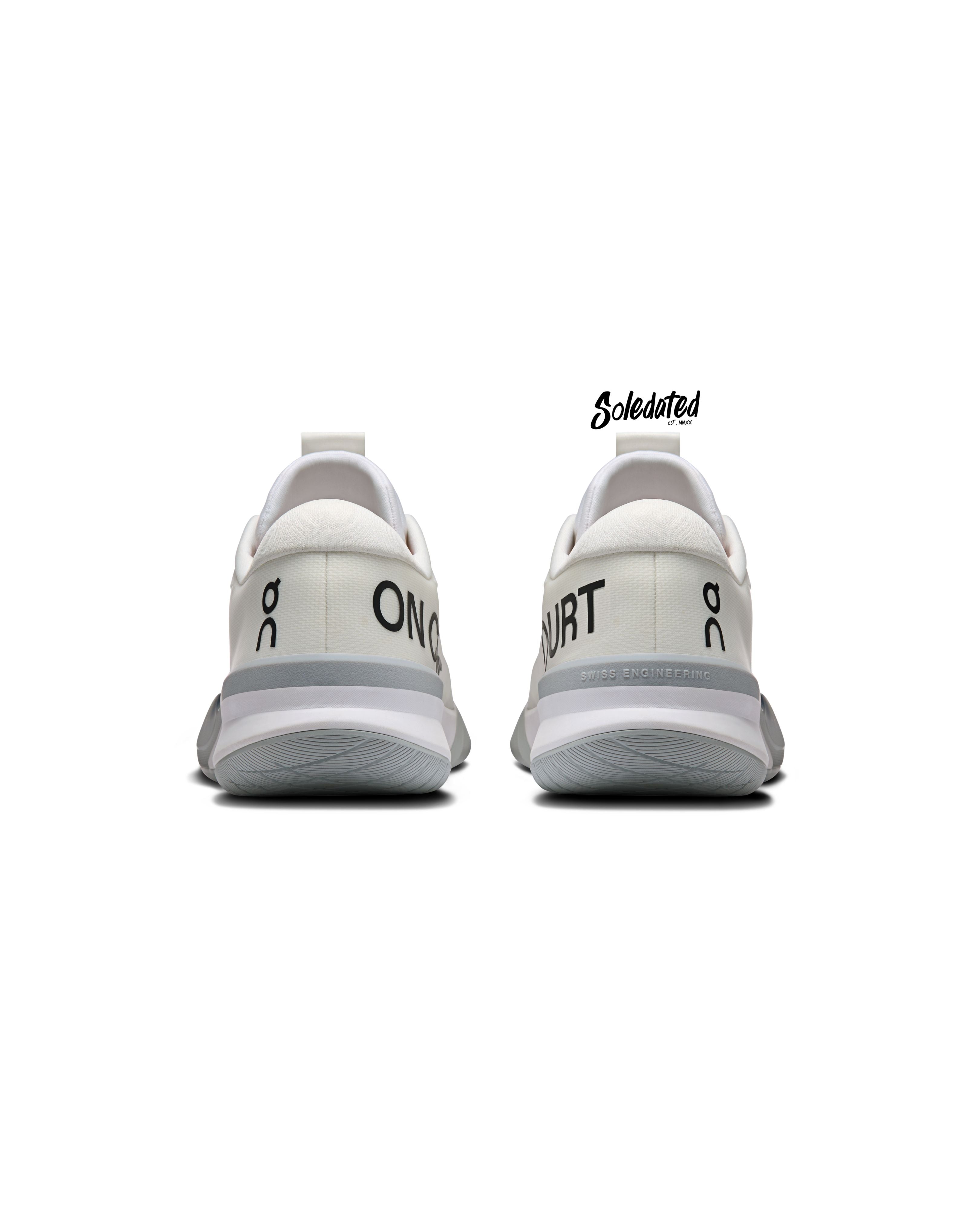 Rear view of On THE ROGER Pro 3 White Pink tennis shoes showing padded heels and On Court branding