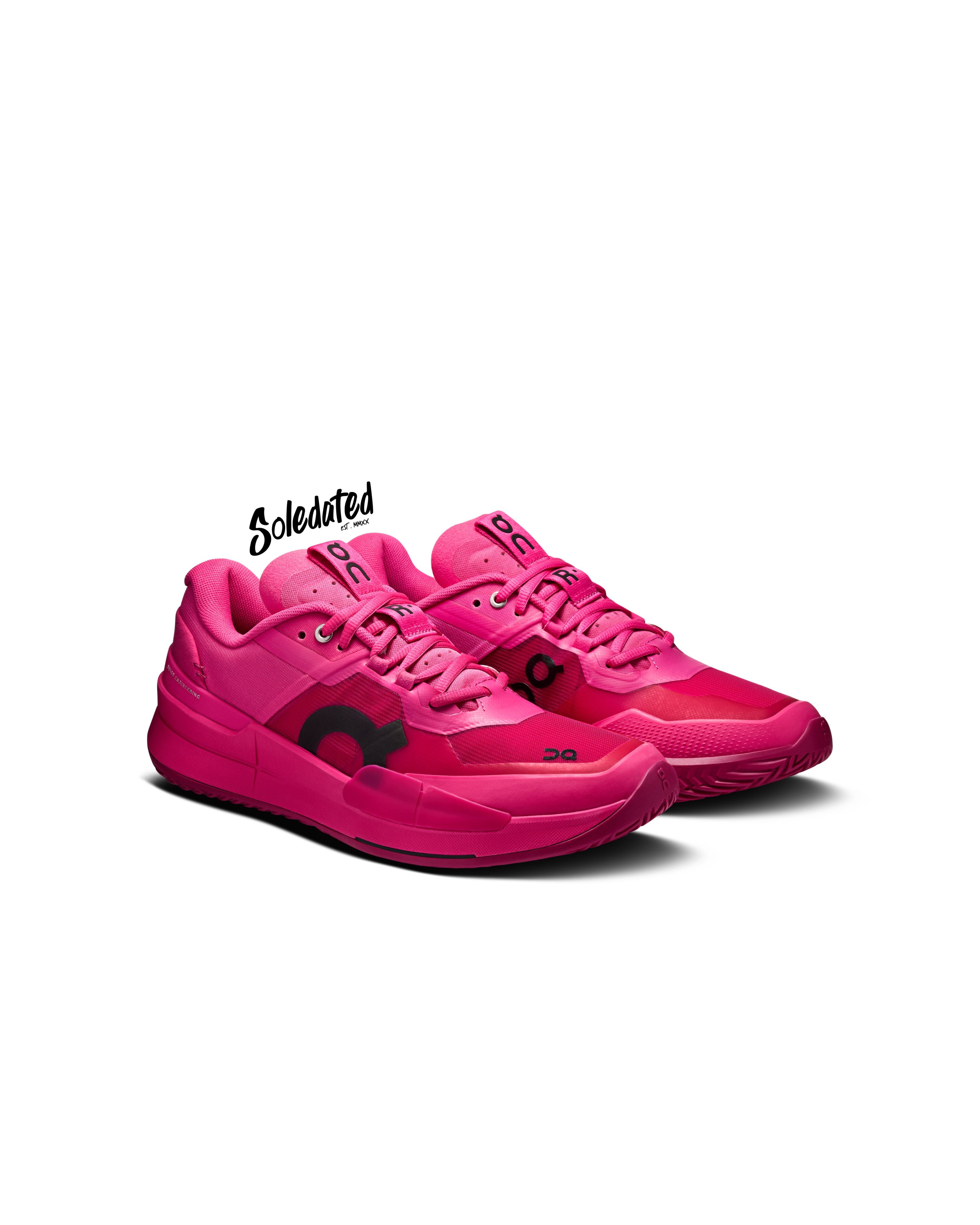 Three-quarter front view of On THE ROGER Pro 2 Pink Grenadine tennis shoes