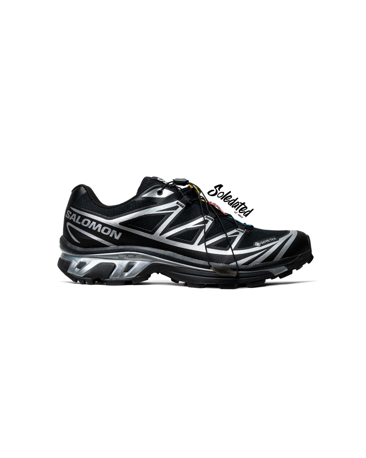 Salomon XT-6 Gore-Tex Black Silver sneaker side profile showing the technical upper and Quicklace system